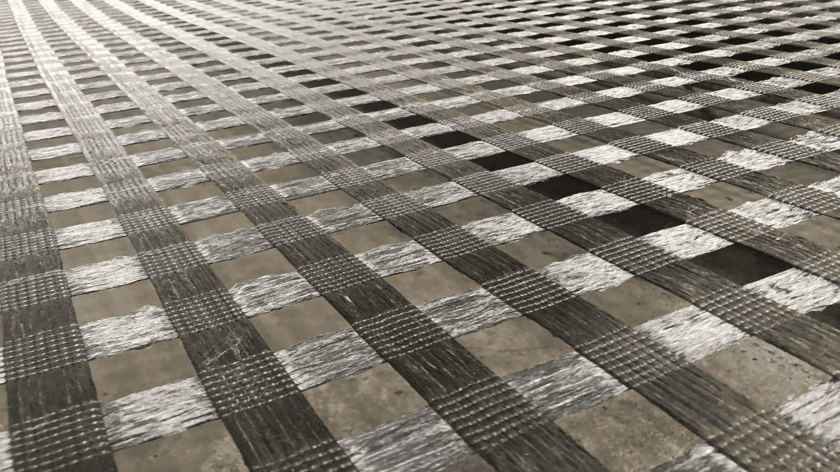 PET geogrid supplier,polyester geogrid,soil reinforcement geogrid,ground stabilization grid