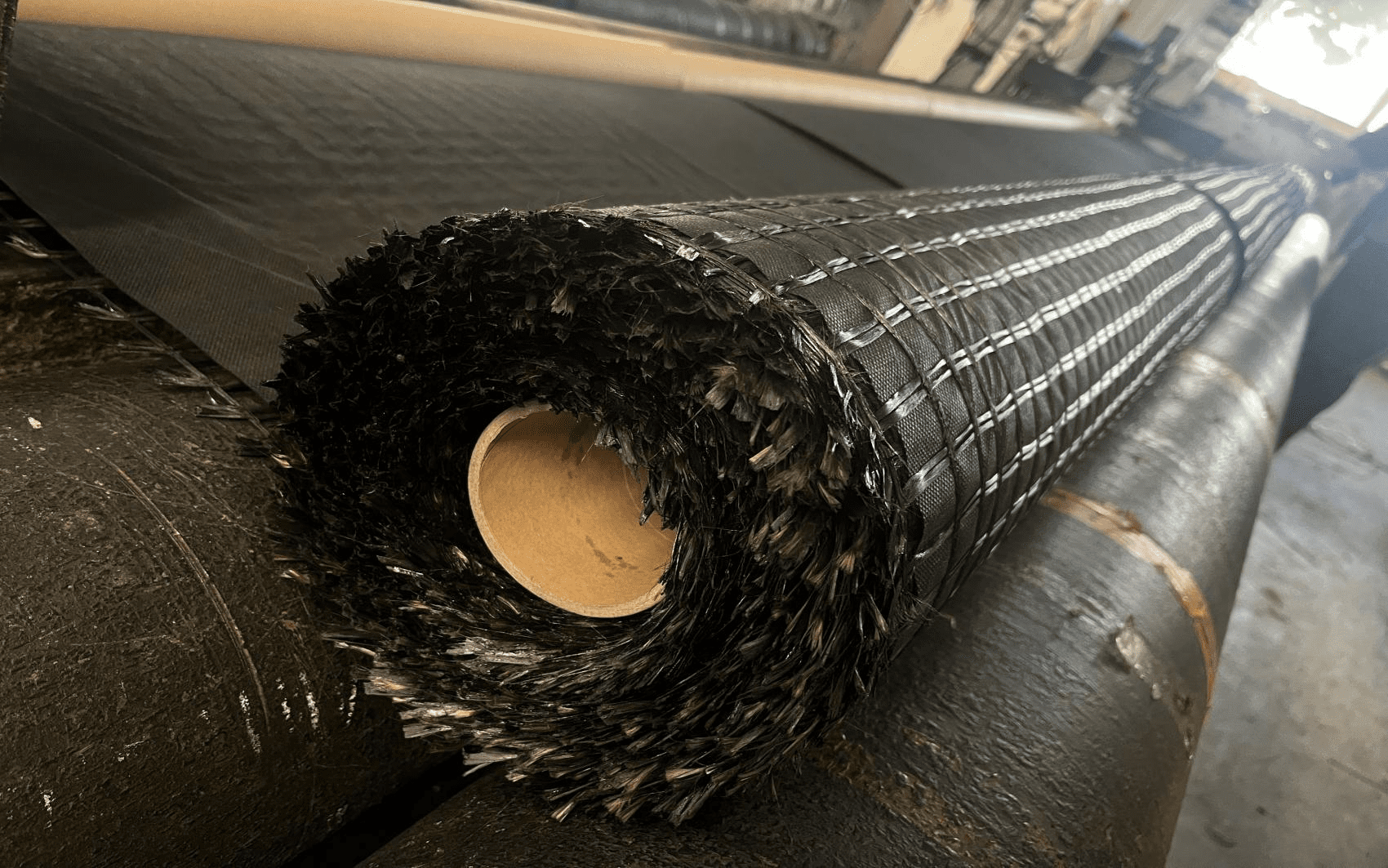 knitted fiberglass geogrid,nonwoven geotextile composite,soil stability geocomposite,drainage filter composite